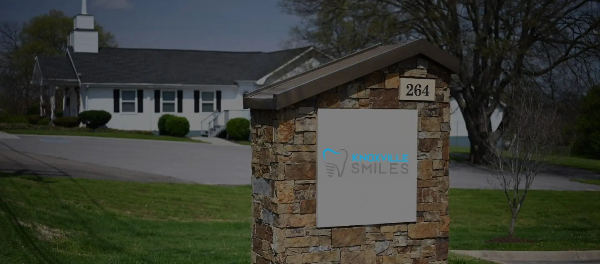 Dentist office location sign at 264 S Peters Rd in Knoxville, Tennessee.