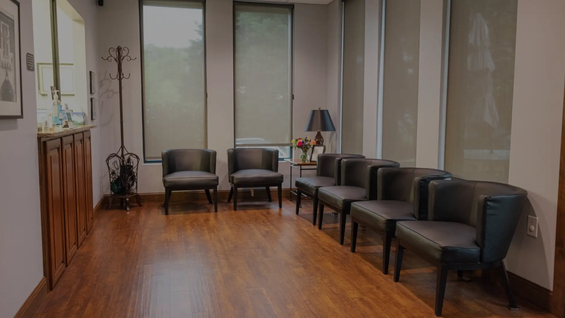 Modern dental office waiting room with comfortable seating and large windows in Knoxville.